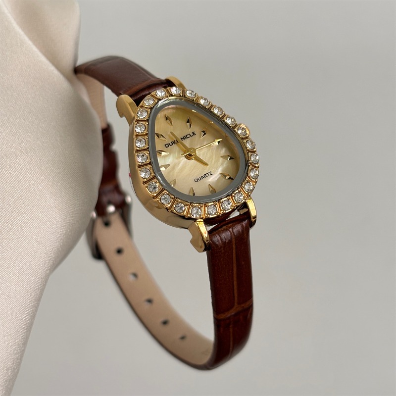 Lüks Kadın Kuvars Saat Altın O - Luxury Watch Gold And Black incelemesi ve fiyatı